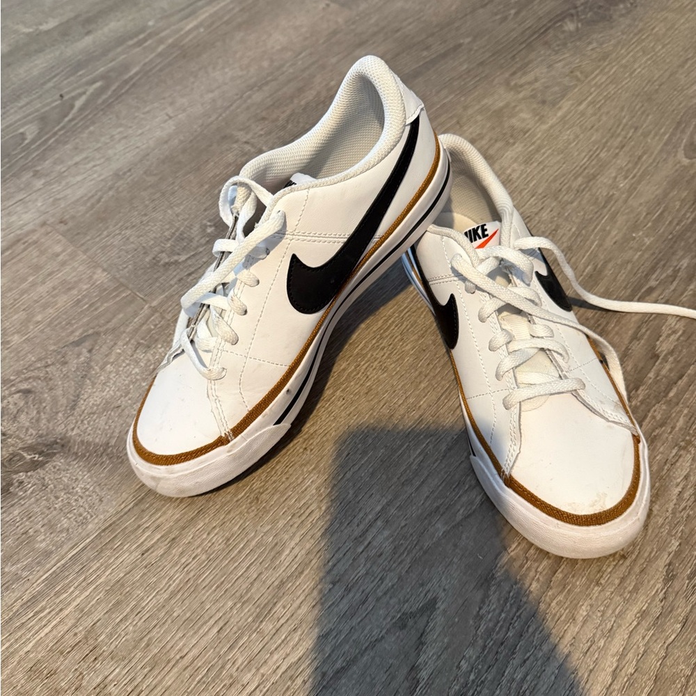 Nike women’s White Sneakers with Black Swoosh
